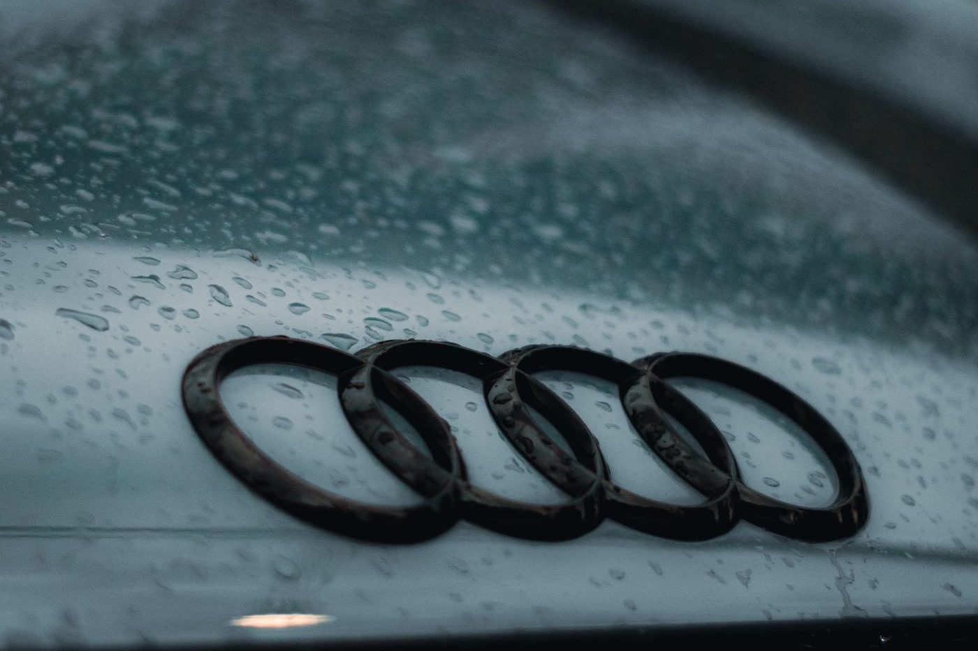 The four interlinked Audi rings on the front of a car