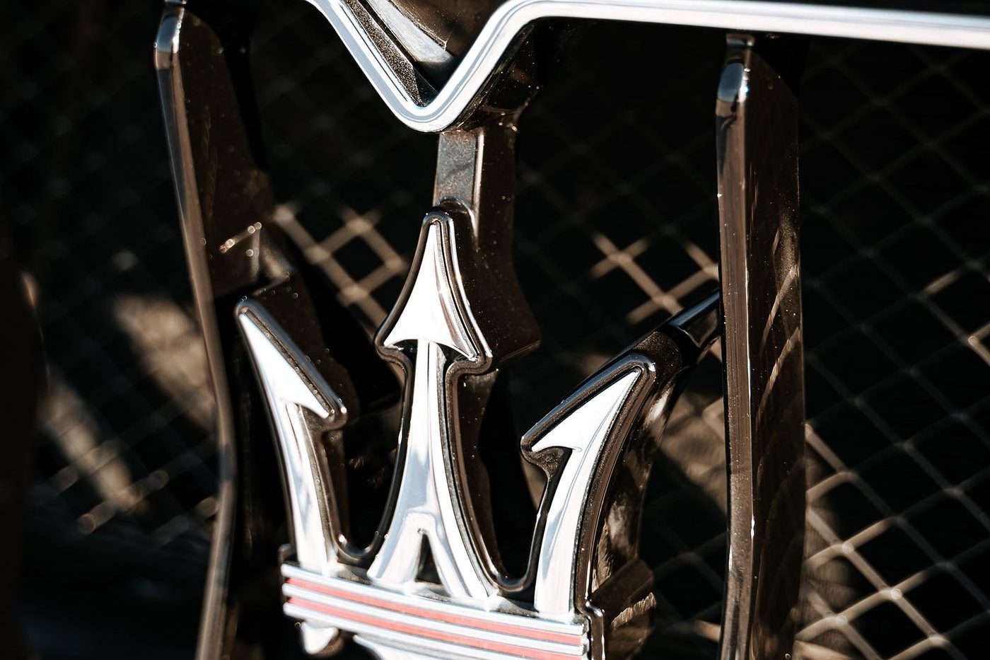 Maserati trident on a car grille